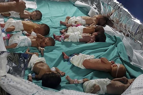 Premature babies lying side by side without oxygen in Shifa Hospital in Gaza City, November 12, 2023