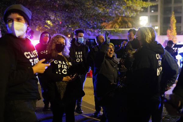 Washington, DC protesters cheering outside the DNC headquarters, November 15, 2023.