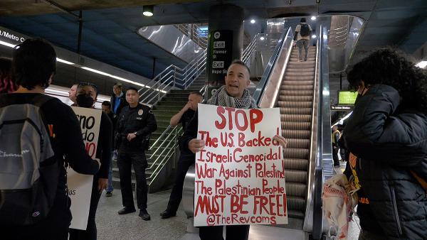LA RevComs agitate on the trains around genocide in Gaza, January 11, 2024.