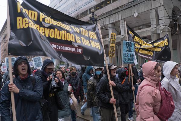 San Francisco: Many were influenced by the contingent and joined in the call and response: “No Fascist Trump! No Genocide Joe!  The whole damn system’s got to go!”  And “How do we get out of this mess?  Revolution Nothing less!” 