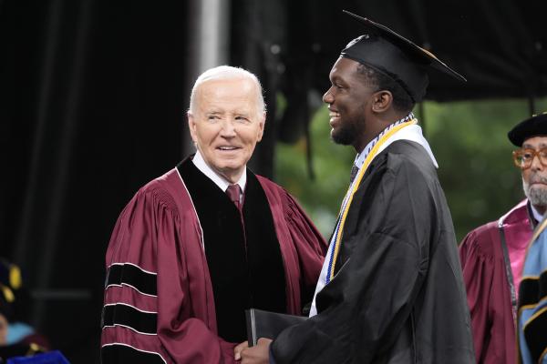Biden shakes hands with valedictorian DeAngelo Jeremiah Fletcher at Morehouse College commencement May 19, 2024