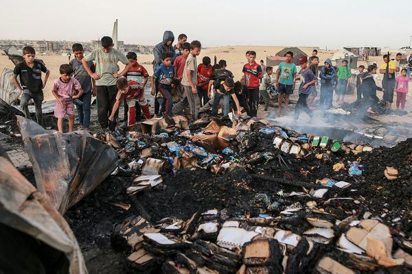 Destruction from Israeli airstrike on displaced persons refuge that killed at least 35 Palestinians including women and children, May 27, 2024.