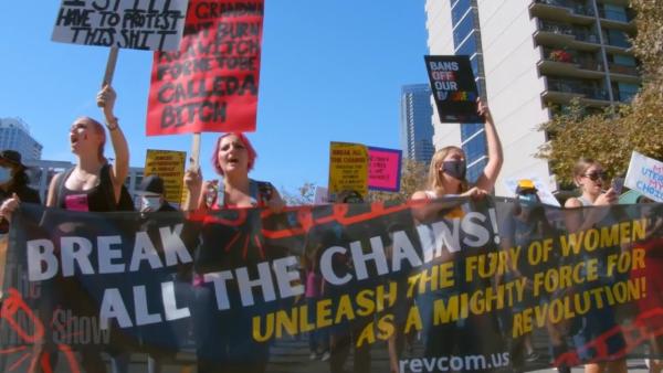 Abortion rights march with banner: Break All the Chains! Unlease the Fury of Women as a Mighty Force for Revolution!