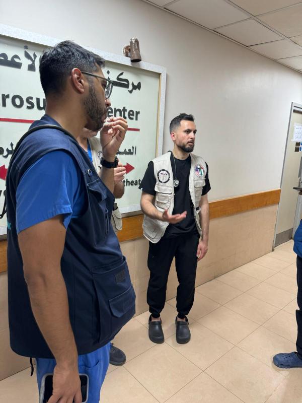 Dr. Mohamad Abdelfattah, a surgeon from California with colleagues, at the European Gaza Hospital (EGH) in Gaza, May, 2024