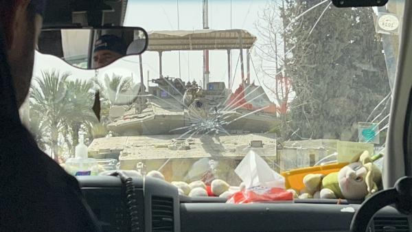 Confronting an Israeli tank while entering Gaza