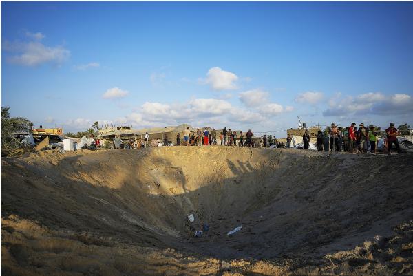 Crater at Al Mawasi refugee tent camp from an Israeli strike that killed at least 40 people and wounded 60, September 10, 2024.