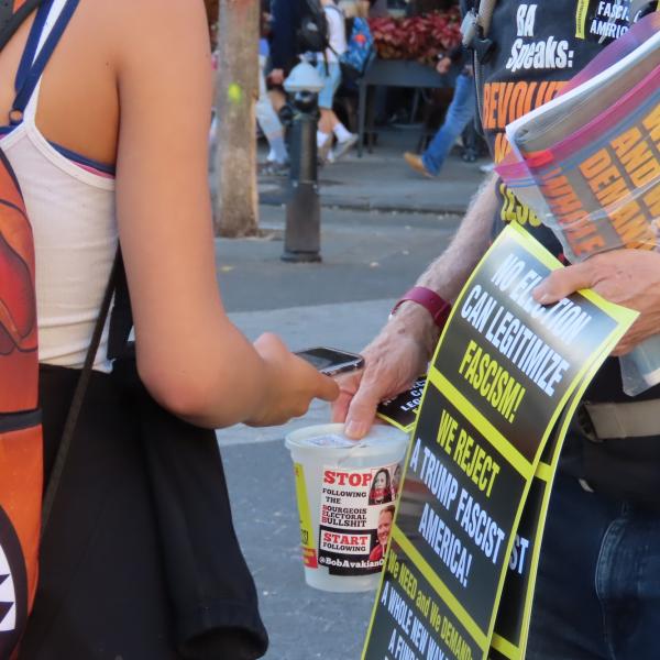 Woman donating to get posters and stickers: No election can legitimize fascism. We reject a Trump fascist America!