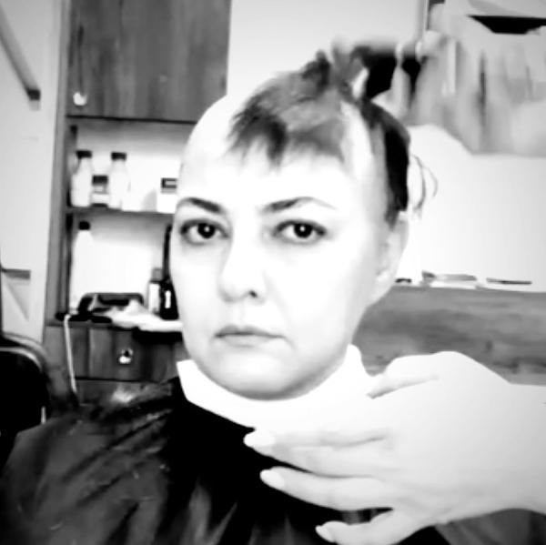 Anahita Hemmati, head shaved in protest