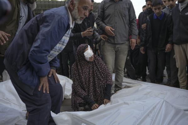 Palestinians mourn victims of Israeli air strike on Nuseirat Camp December 12, 2024