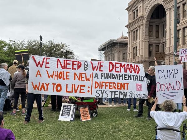 RCC banner at Hands Off protest in Austin, Texas, April 5, 2025.