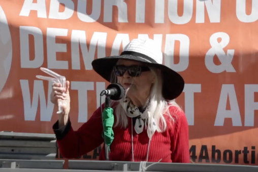 Carol speaking at an abortion rights rally, downtown LA on International Women's Day, March 8, 2022