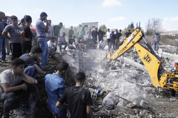 Palestinians see their homes bulldozed by Israeli military in the West Bank village of Qabatiya, August 4, 2025.