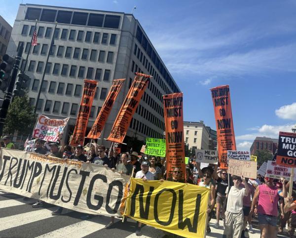 Refuse Fascism banner leads march in Washington DC, August 16, 2025