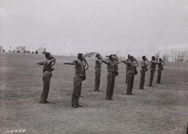 Segregated troops practice movement in protective gear at Edgewood Arsenal in Maryland in the early 1940s.