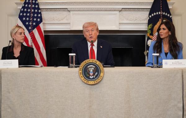 Trump speaks during a roundtable meeting on antifa as AG Pam Bondi and Secretary of State Kristi Noem listen, October 8, 2025.