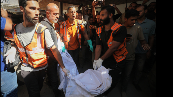 The bodies of Palestinians, killed by the Israeli army after allegedly crossing the ceasefire line, are brought to Al Ahli Hospital in Gaza City, October 18, 2025.