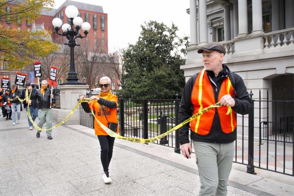 Surround the White House 1.0, Jim leads with yellow crime tape, November 15, 2025.