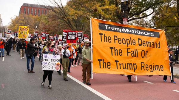 Surround the White House 1.0 march behind banner, November 15, 2025.