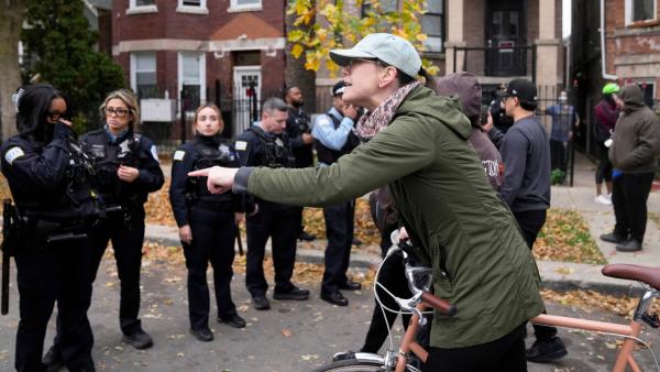 People protest ICE actions in Little Village, Chicago, November 8, 2025.