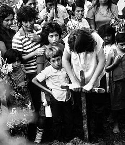 Young girl whose mother was killed by Nicaraguan contras at her mother's burial.
