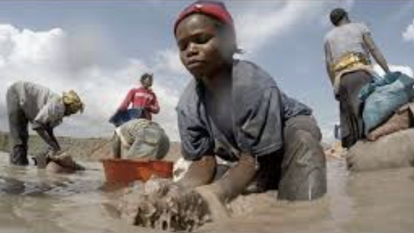 Some of the 40,000 children in the DRC who dig tunnels and haul rocks from cobalt mines in 2018. Cobalt is an essential mineral for the lithium-ion batteries used in electric vehicles, laptops and smart phones.