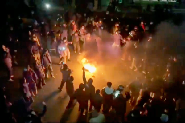 Thousands of protesters dance around fire in Iran, January 9, 2026.