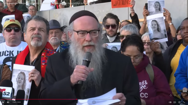 Faith leaders lead vigil for Renee Good in Los Angeles.