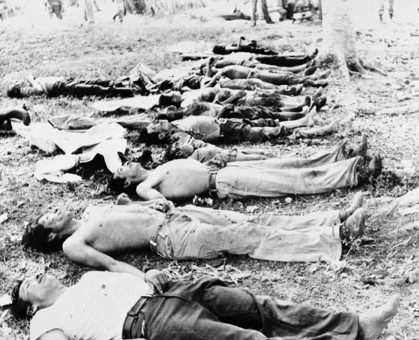 Bodies of some of the 20 villagers killed near Salacuin, in northern Guatemala, May 11, 1982