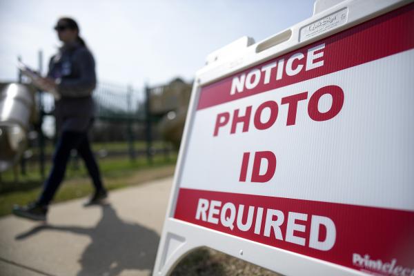 Photo ID Required sign in front of North Carolina voting location, March 5, 2024.