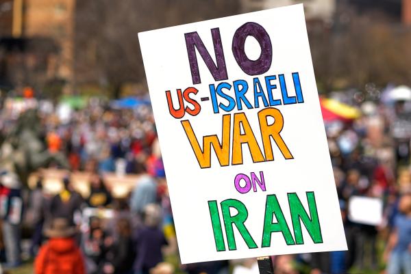 A sign at No Kings Day, "No War on Iran," in Kansas City, Missouri, March 28, 2026.