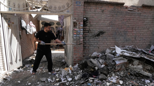 Residential building hit by a U.S.-Israeli strike in Tehran, March 27, 2026.