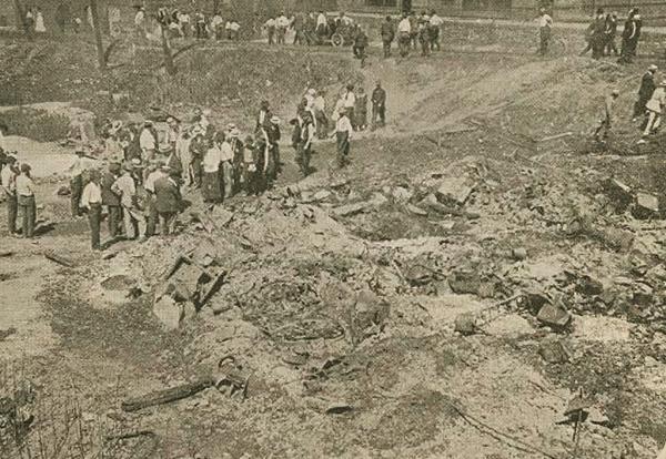 After East St. Louis massacre, residents search for victims. Six were found.