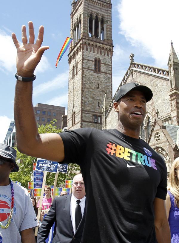 Jason Collins, NBA player, marches in Boston's gay pride parade, June 8, 2013.