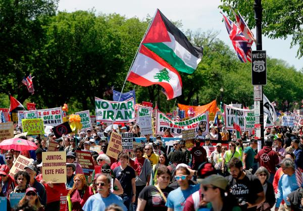 Demonstrators rally at the National Mall on May Day 2026.