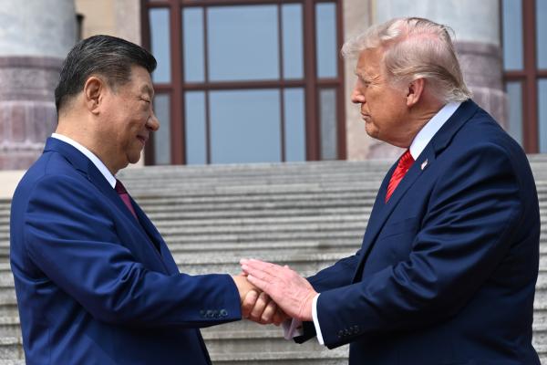 Chinese President Xi Jinping shakes hands with U.S. President Donald Trump in Beijing, May 14, 2026.