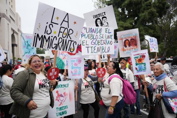 Crowd with signs at May Day Rally in Los Angeles, May 1, 2026.