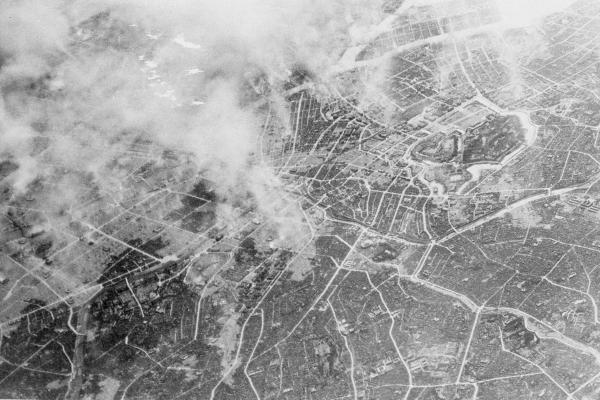 After the U.S. firebombed Tokyo March 10, 1945, plumes of smoke, rise 15,000 feet in the air.