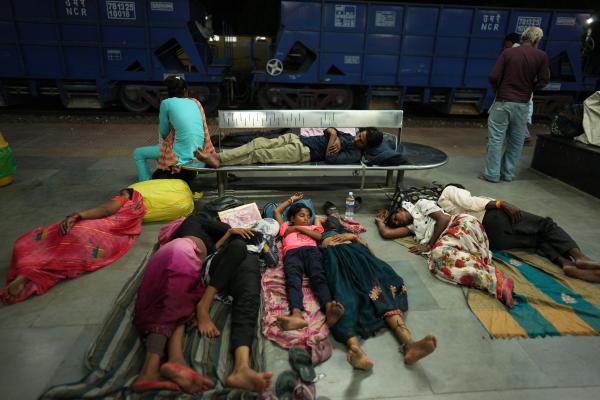 Residents of northern India sleep on railway station platform to escape extreme heat, June 20, 2026.