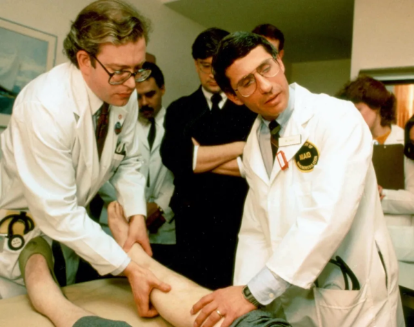 Dr. Anthony Fauci treats an AIDS patient at NIH in 1987