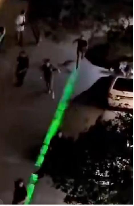 Protesters fleeing police attack in Alikhani Square, Iran, July 28