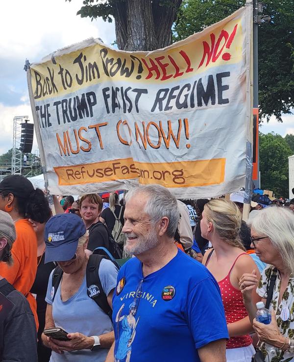 Refuse Fascism banner at March on Washington, August 28, 2026.