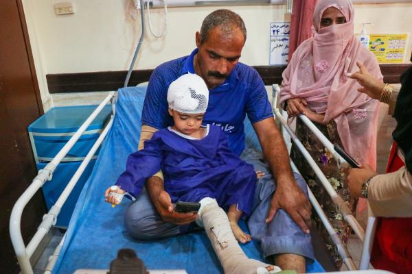 Child wounded in a strike by U.S. on a home where a wedding was being held in southern Iran, August 30, 2026.
