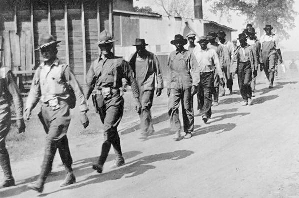 2-USArmy-march-Black-Farmers-ElaineAK-Oct1919-PH-AKStateArchives-600px.jpg