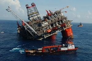 Oil rig tipping over