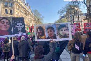 Paris International Women's Day posters of women demanding Free All Political Prisoners In Iran Now