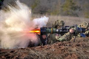Ukrainian serviceman fires NLAW anti-tank weapon in exercises.