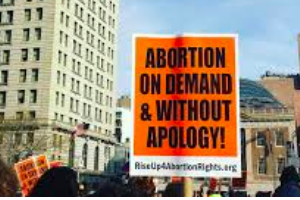 Abortion on demand and without apology sign in protest