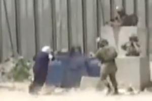 Palestinian woman being shot by Israeli soldiers