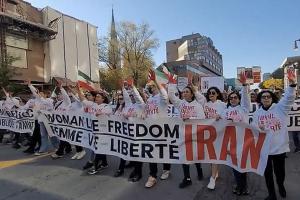 Montreal lead banner—Freedom for Iran—in march for Iran, October 22, 2022