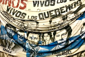 Banner with the faces of Honduran victims who were “disappeared” in the 1980s. Credit: Committee of Relatives of the Disappeared in Honduras